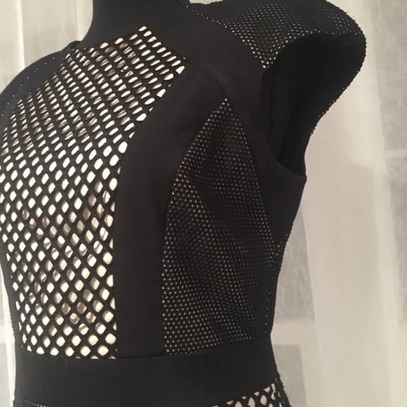 Modern open back black mini dress by Cameo - Picture 2 of 7